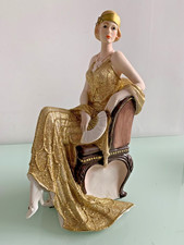 Elegant Ceramic Lady Figurine Seated on Chair Gold Glitter Dress Ornament 34cm