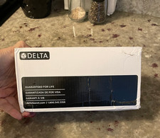 NEW IN BOX DELTA LAHARA CHAMPAGNE BRONZE TOILET PAPER HOLDER