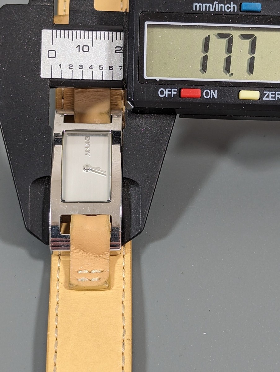 DKNY Silver Tone Dial Rectangle Case Brown Leather Band Watch 7