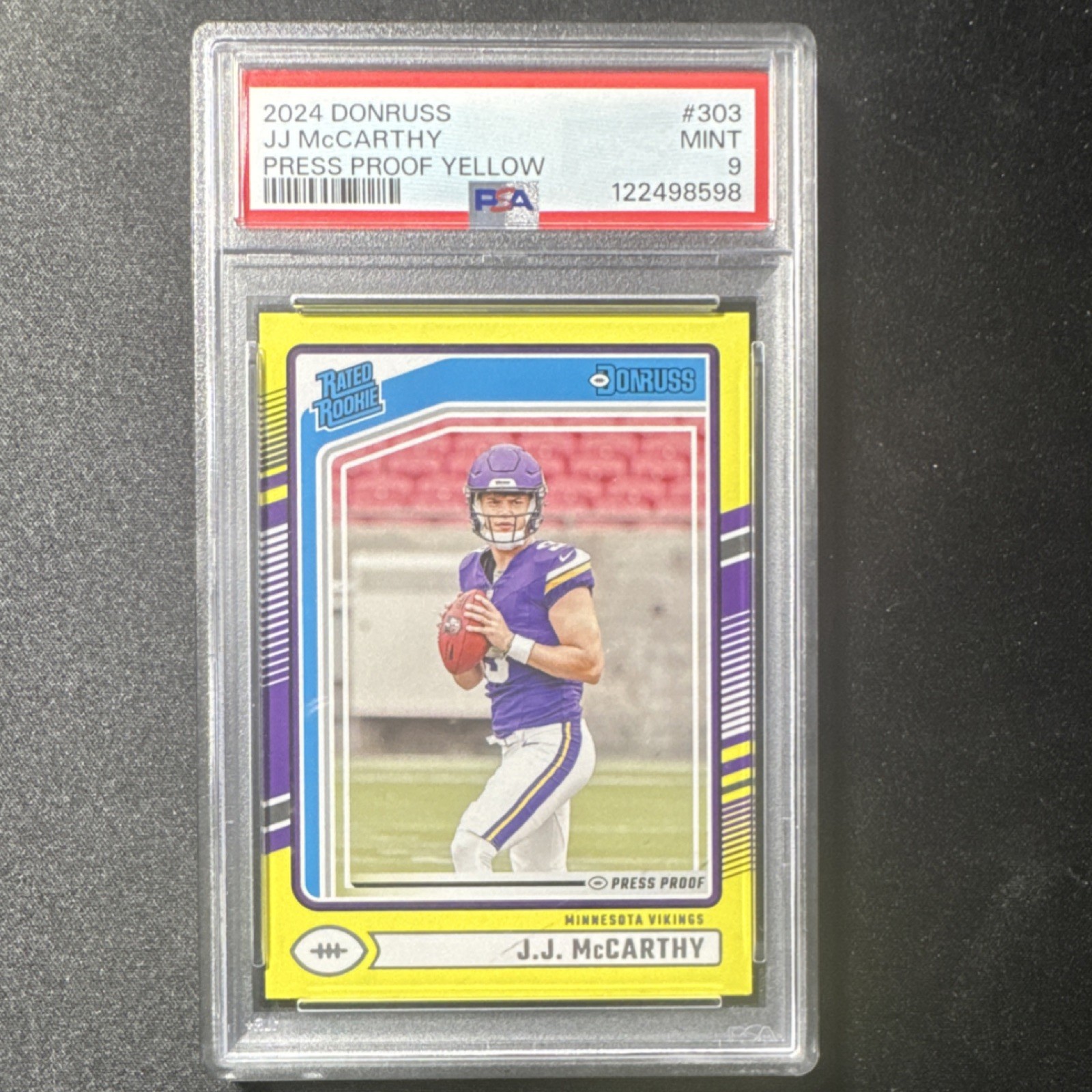 2024 Panini Donruss Rated Rookie JJ McCarthy #303 Press Proof Yellow PSA 9 NFL