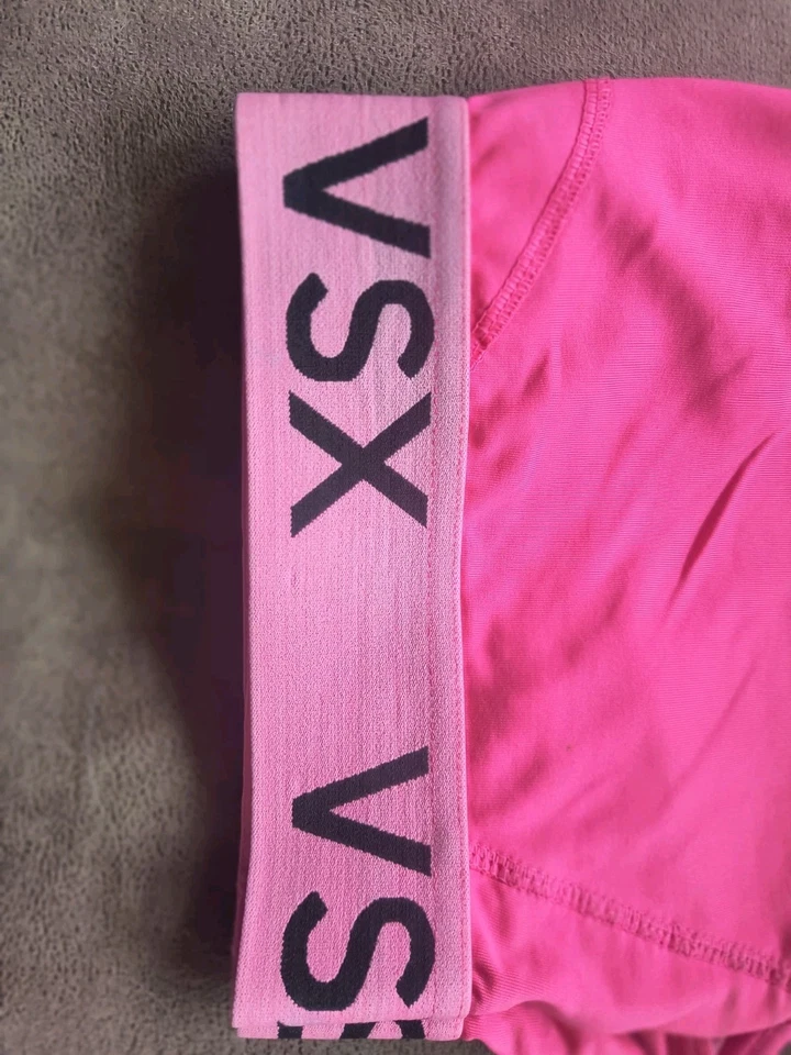 Sujetador deportivo Victoria's Secret espalda cruzada rosa intenso VSX talla pequeña bajo impacto Foto 3 de 4