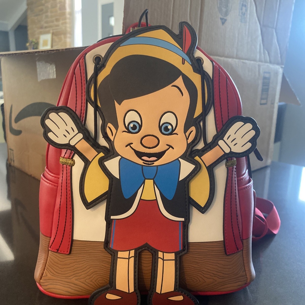 Disney Loungefly Pinocchio Marionette Mini Backpack WDBK2238 Amazon.com | Loungefly Disney Pinocchio Marionette Mini  main image 3
