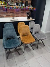 Set of 6 swivel dining room chairs used