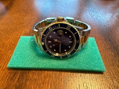 Rolex Submariner Silver and Gold Oyster Bracelet with Blue Bezel