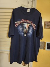 2 Charlie Daniels Band/1 AreoSmith Band /1 Garth Brooks/1 Howlin' Wolf T-Shirts