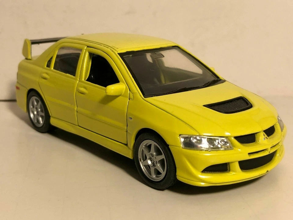 WELLY MITSUBISHI LANCER EVOLUTION XIII EVO 8 YELLOW 1:32 PULL BACK NEW NO BOX - Image 3 of 4