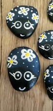 Hand Painted Ladybug Rocks with a floral daisy design. kindness rocks.