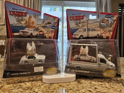 Disney Pixar Cars 2 The Popemobile & Pope Pinion IV Deluxe Die-cast Set 2010 HTF