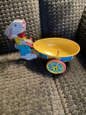 CHEIN TIN BUNNY WITH METAL LITHO WHEELBARROW EXCELLENT CONDITION WORKING