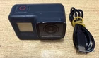 GoPro Hero 7 Black Works perfect average condition camera & cable only Superb