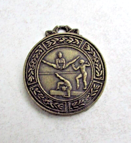 Ancienne médaille en métal Gymnastique (Poutre, Barre fixe, sol) - Photo 1/3
