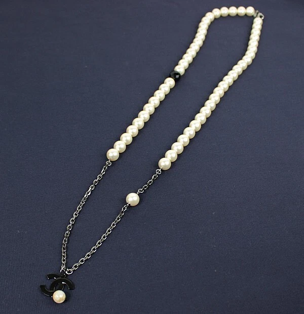 Used chanel pearl best sale necklace