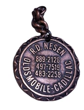 Keychain R.D Nesen Oldsmobile Cadillac Oxnard California Assistant Secretry Navy