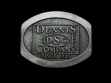 LC13101 VINTAGE 1980s  DENNIS SUPPLY COMPANY  SINCE 1935 BELT BUCKLE