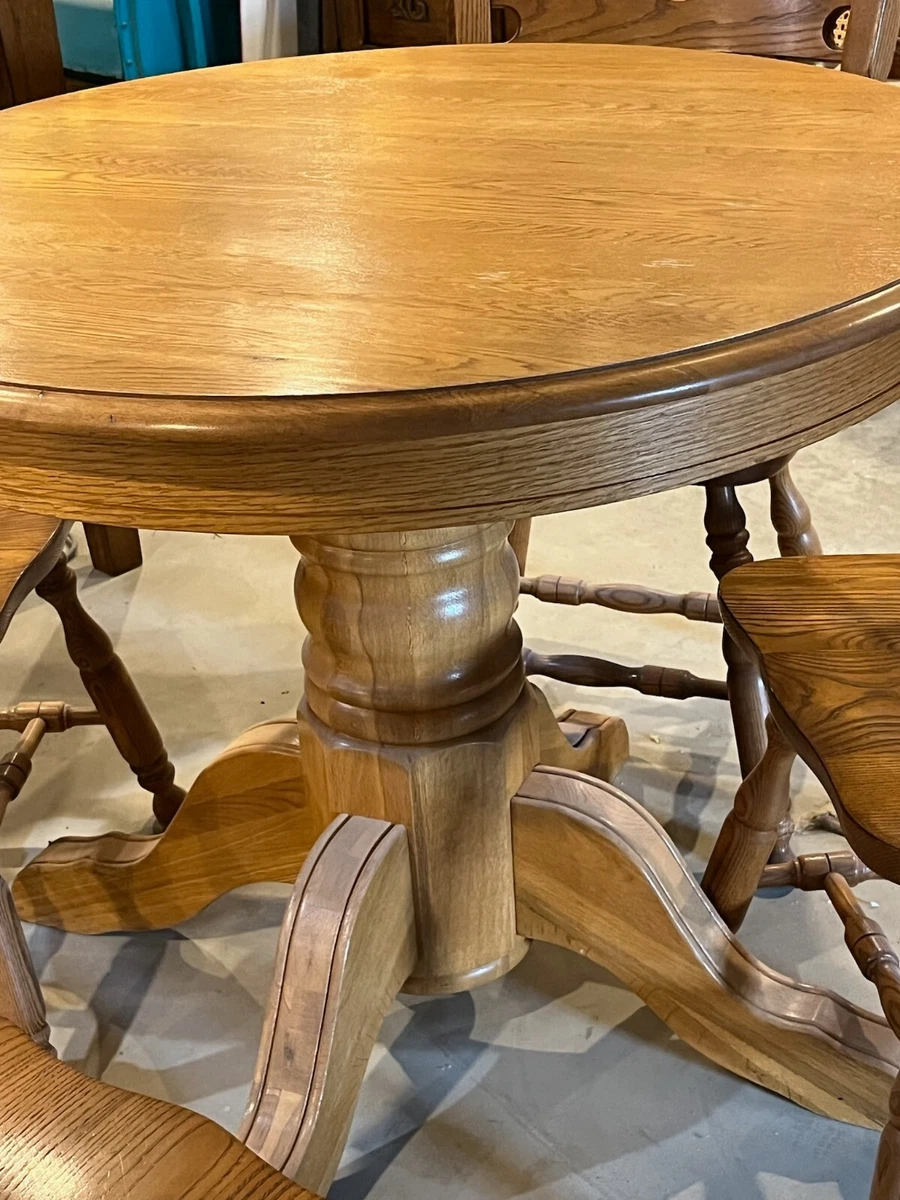 Solid oak round table with 4 oak chairs