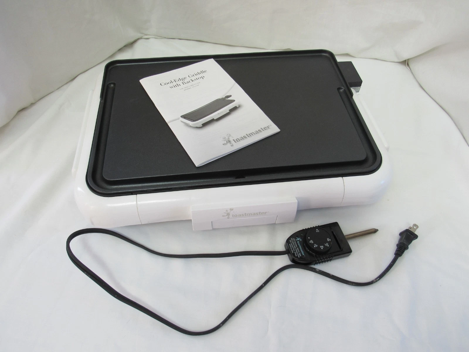 Tostmaster Electric Cool-Edge Griddle W/Backstop and Drip Tray - 10" x 15" TG15W