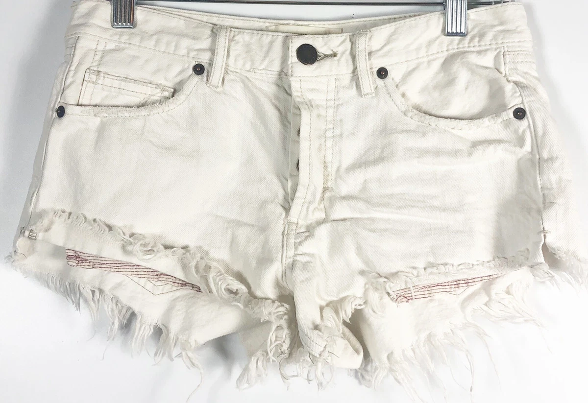 Destroyed white denim best sale shorts