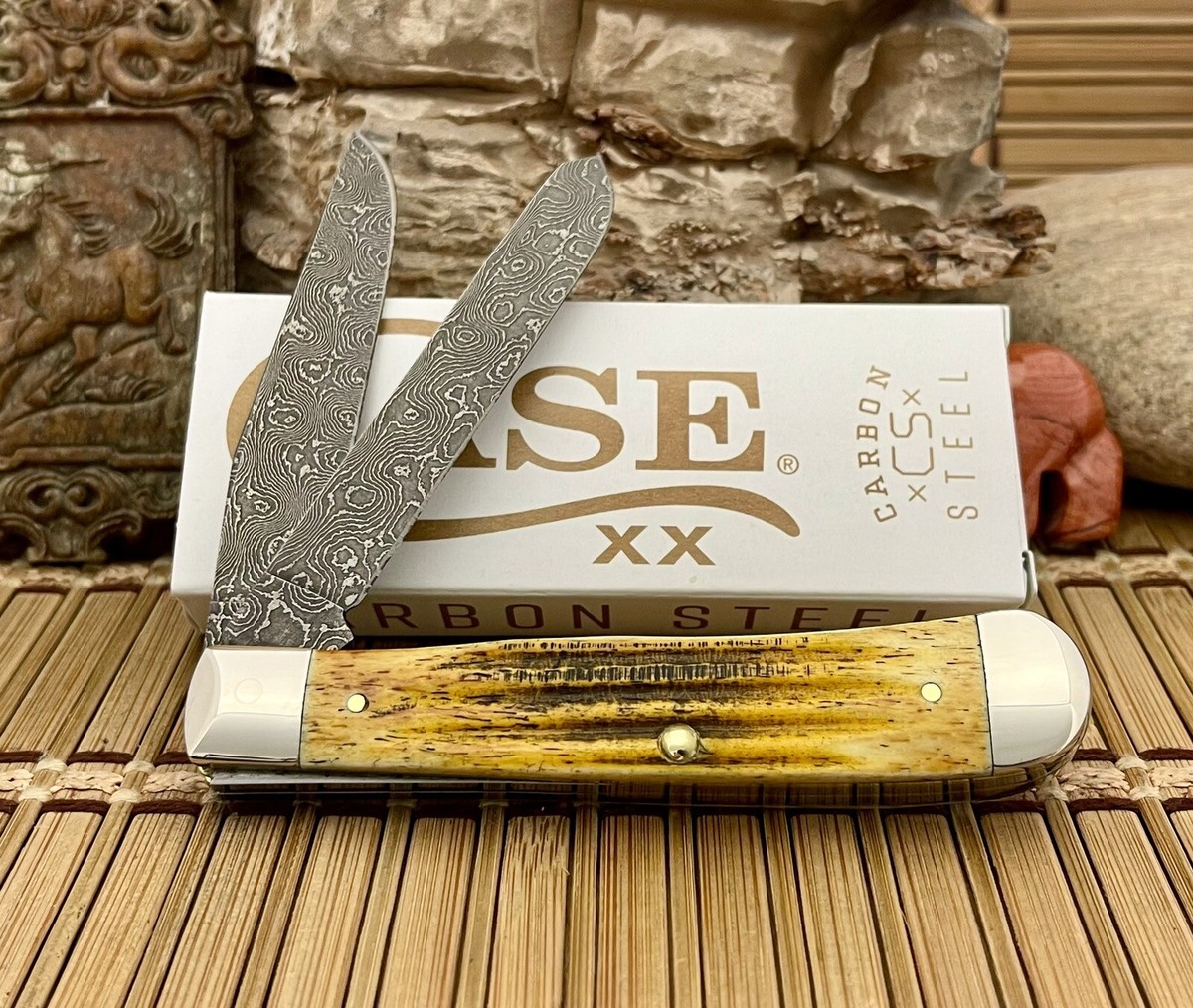Case XX USA 2023 Burnt Goldenrod Bone Raindrop Damascus Trapper