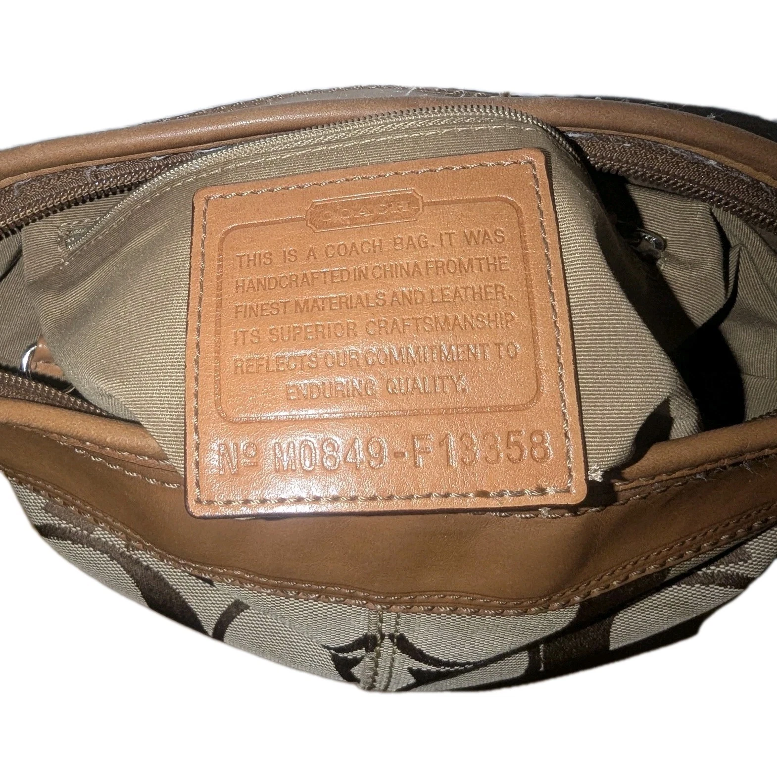 Borsa a secchiello Coach Signature Bleecker marrone e pelle marrone tela