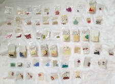 Lot of 57 Swarovski Faceted Crystals in Various shapes, sizes and colors