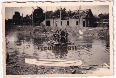 Photo Cycling Troop on Raft River Crossing Destroyed Houses Debris (A7)