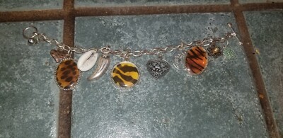 AAI 7 1/4 inch vintage charm bracelet, toggle clasp silver tone