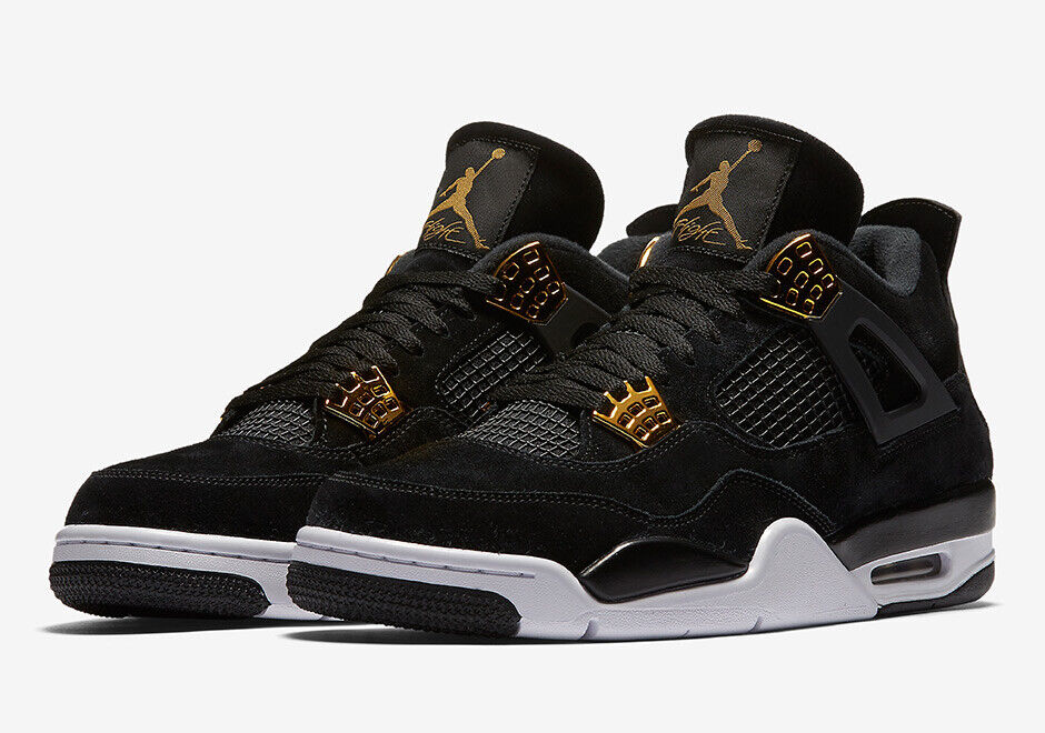 gold and black jordan 4s