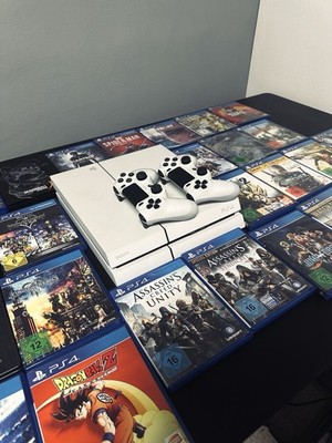 Sony PlayStation 4 Pro 1TB Weiß + 27 Spiele und 2 Controller