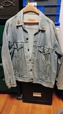 Vintage Levis Denim Jacket 80s USA Made size Large with patches on the back
