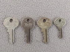 4 ANTIQUE MASTER LOCK KEYS LION AND EMBOSSED USA (A)