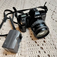 MINOLTA Maxxum 3000i 35mm Film Camera & Charger Promaster Untested No Battery 