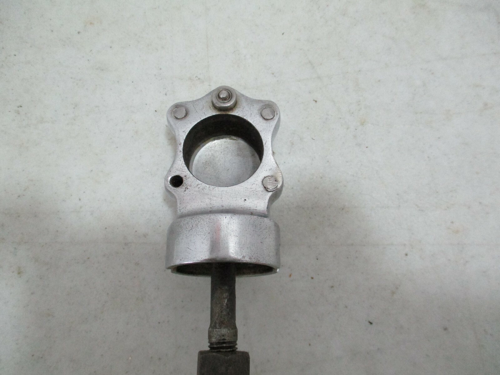 Vintage Rolls-Royce Phantom III starting crank guide under the center spot light