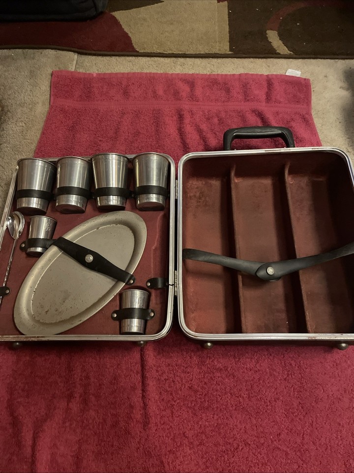 A mid-century fold-out portable liquor attaché case — James Bond energy at a garage-sale price.