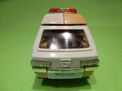 Diaclone toy forms a vehicle with seat