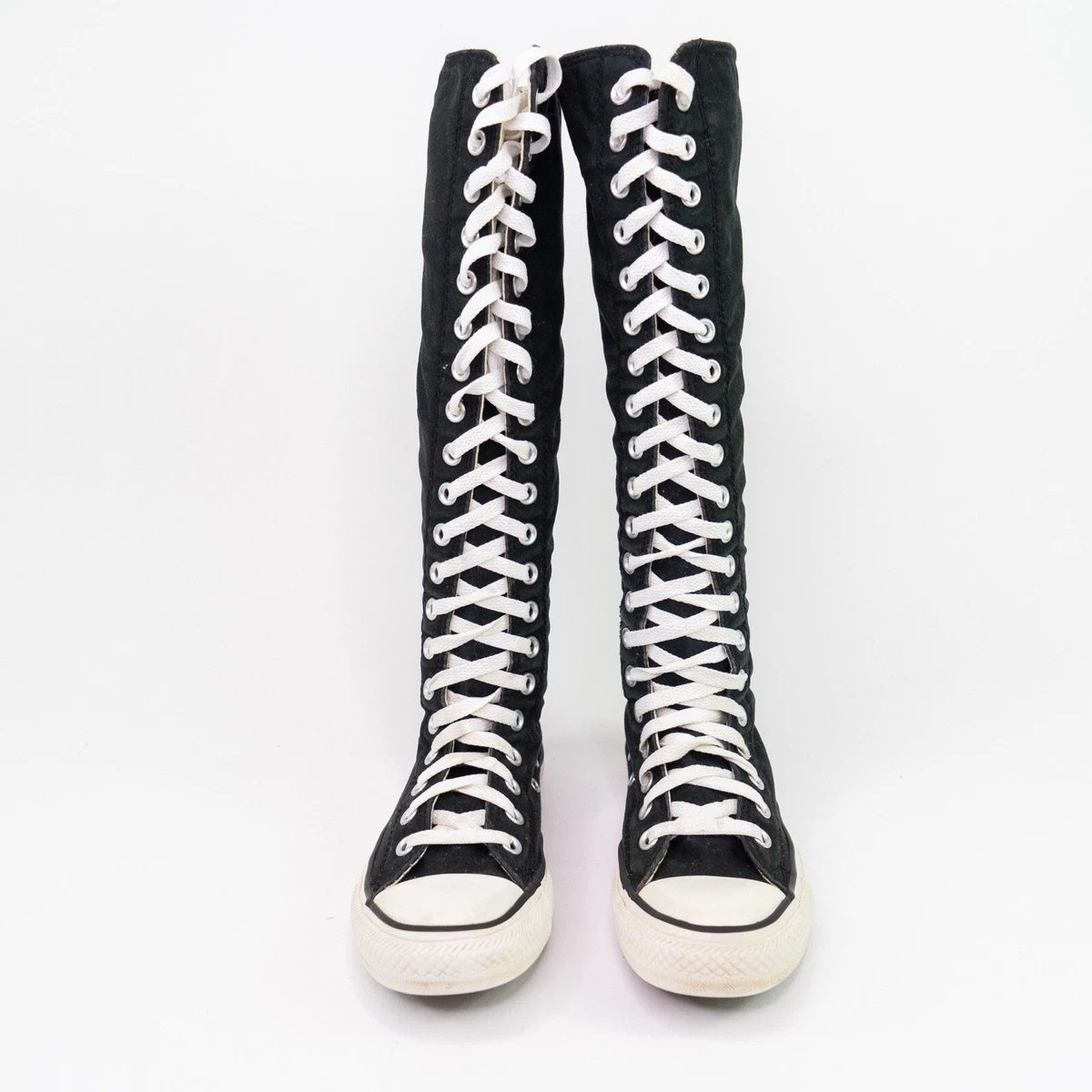 knee high black and white converse