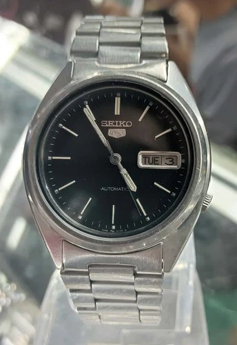 Vintage Seiko 5 7009-3040 Black Dial Day-Date Men’s watch – BMBY Apr 1994