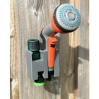 Garden Nozzle Wall Holder – Durable Plastic Mount for Multiple Spray Heads