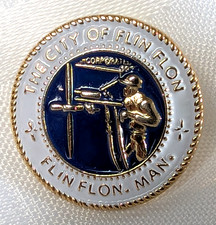 THE CITY OF FLIN FLON MANITOBA SOUVENIR GOVERNMENT WORKER METAL LAPEL PIN CANADA