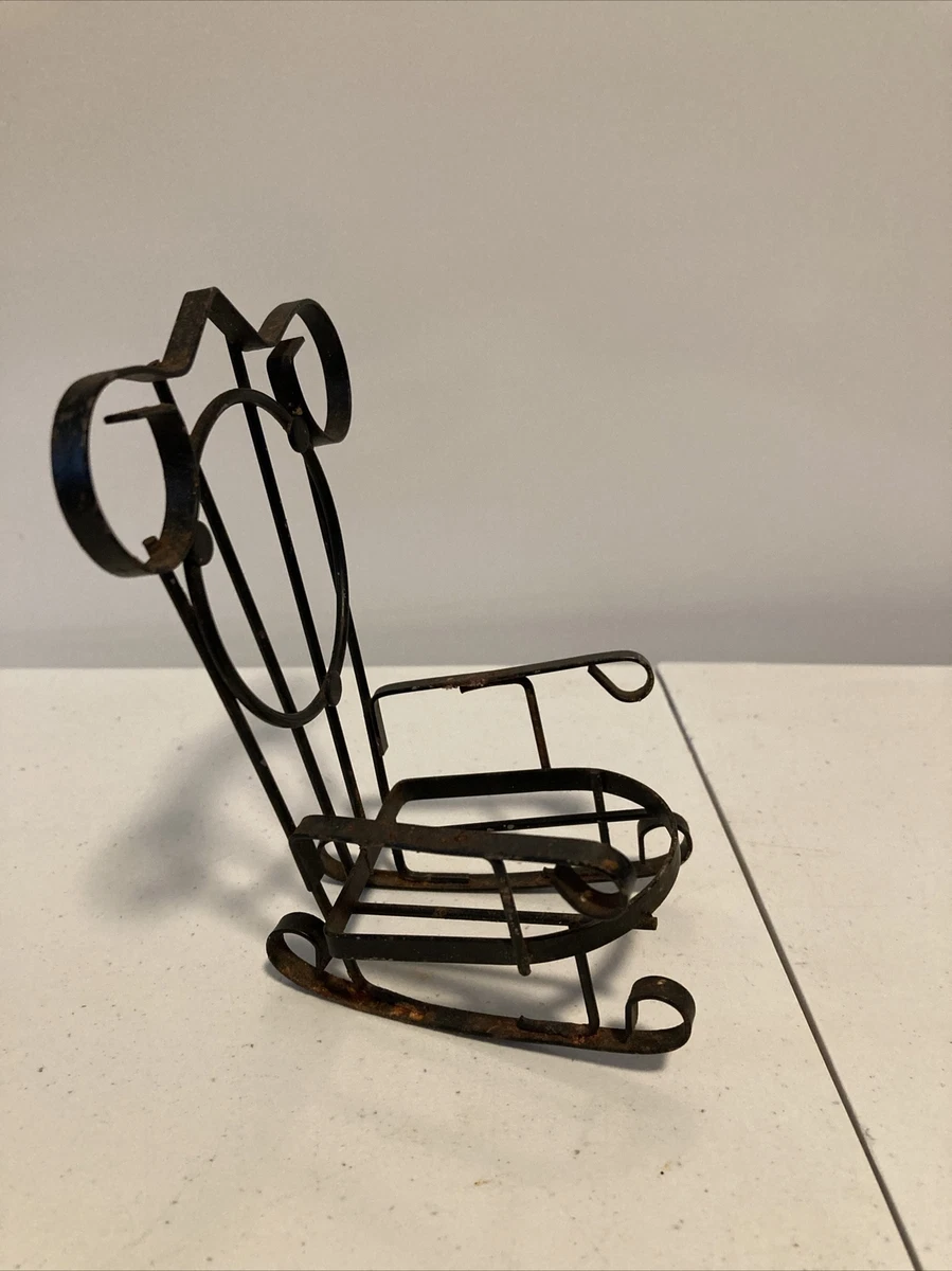 Antique metal rocking on sale chair