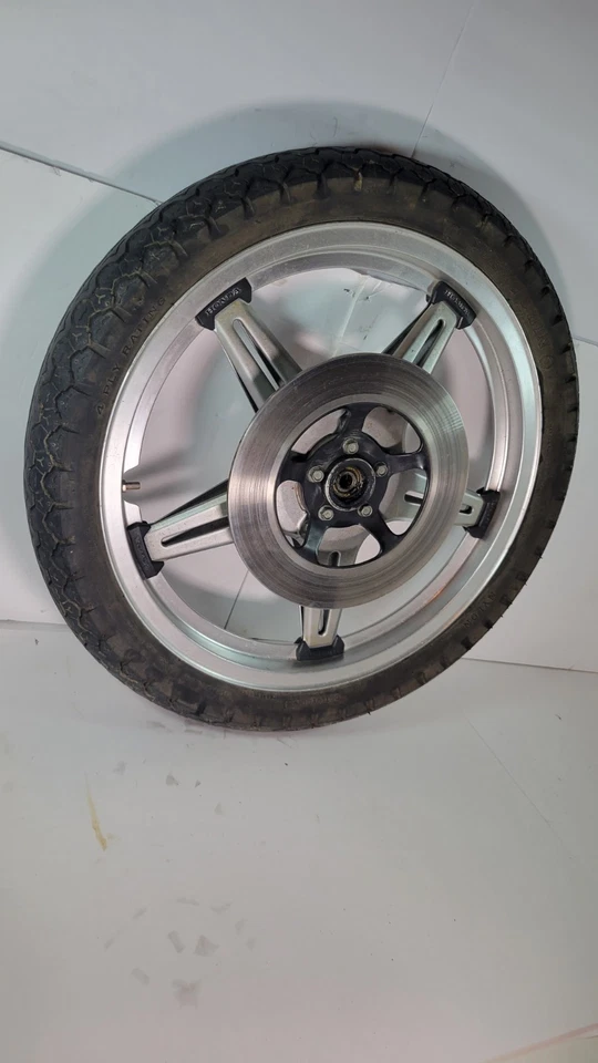 Llanta original de 19" con rotor de freno de rueda delantera Honda Hawk Cb400 Cb400T 1978 OEM Foto 2 de 4