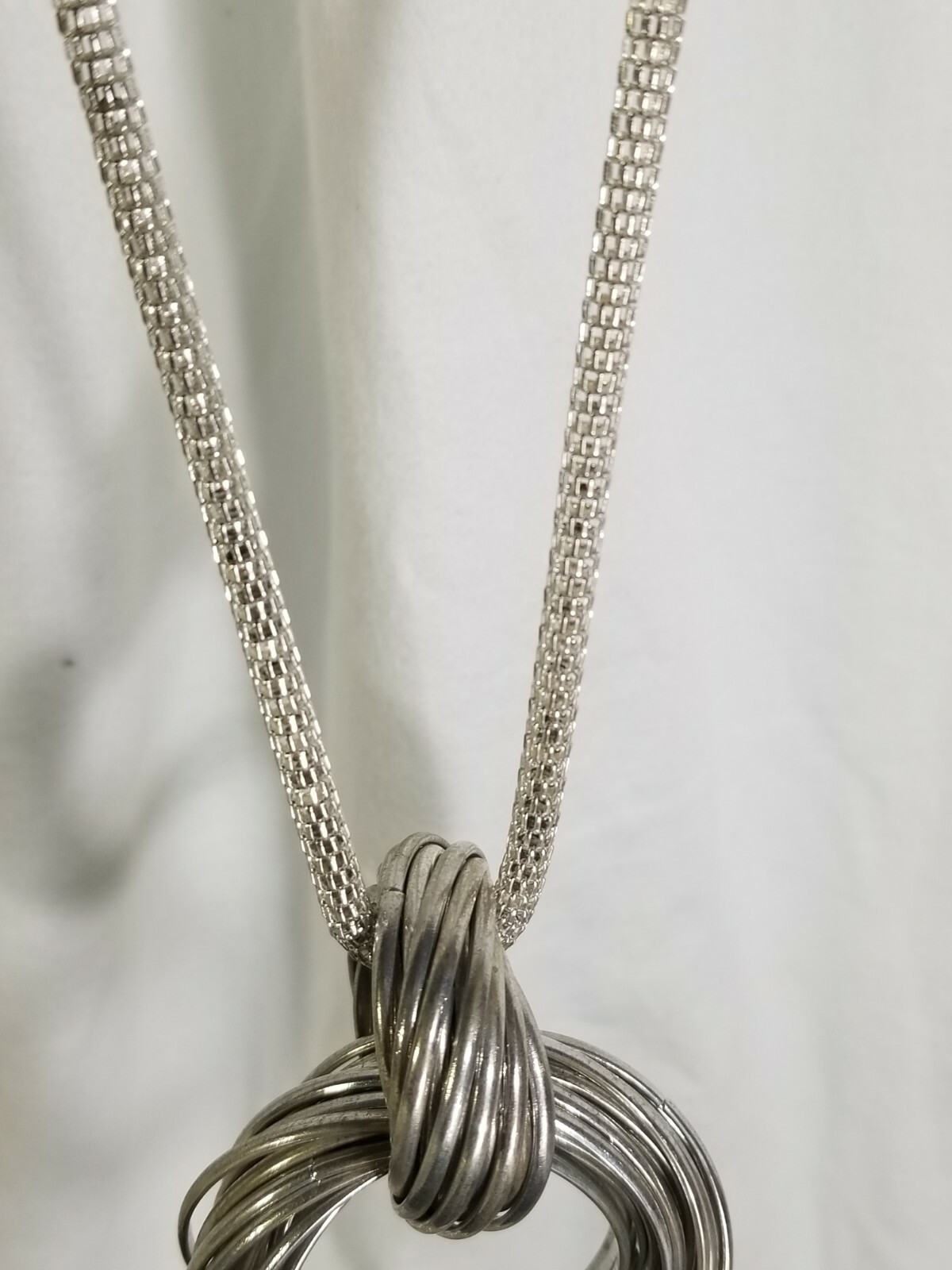 Silver Tone Metal Interlocking Infinity Knot Stat… - image 5