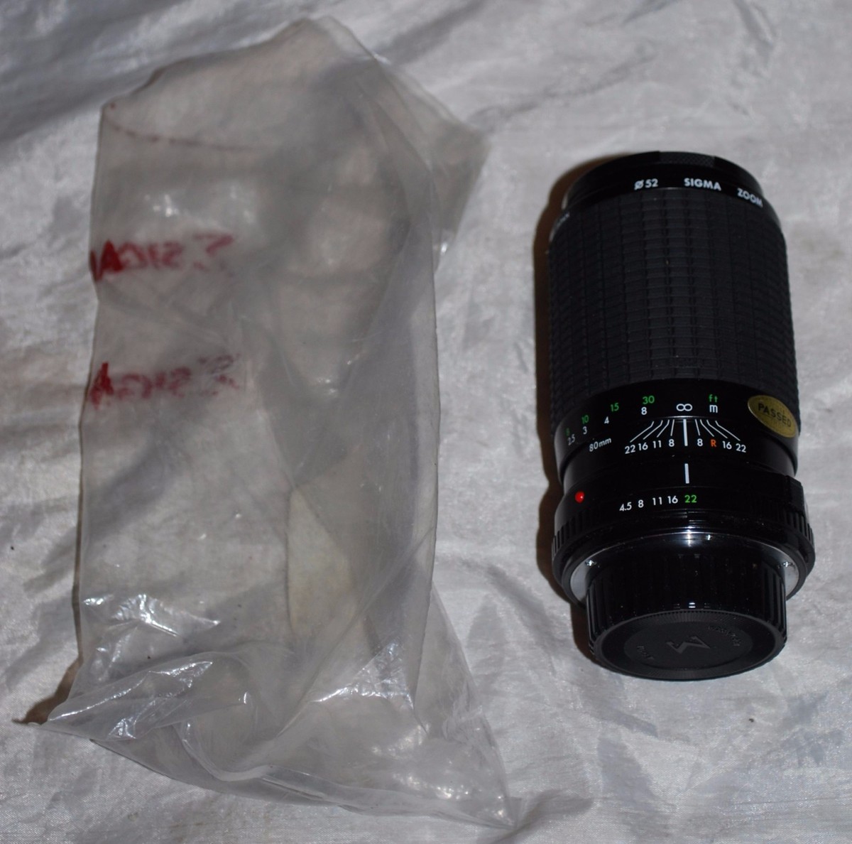 Minolta Sigma Multi Coated Zoom Lens f = 80 ~ 200 mm 1:4.5 ~ 5.6 