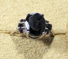 BLACK SPINEL OVAL CENTER AND ROUND ACCENTS - SIZE 6 RING - STERLING SILVER
