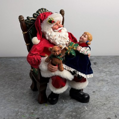 Ashley Cooper Christmas Collectibles￼ Santa with child  And What Would You Like 