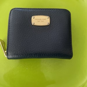 Michael Kors jet set small zip-around bifold wallet in a blue pebble finish