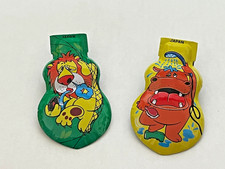 NOS vintage metal Clicker set of 2, Made in Japan metal lithograph