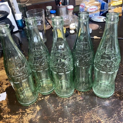 5 Vintage Coca Cola Bottles Embossed Label On Green Tinted Glass Price 5-vintage-coca-cola-bottles-embossed-label-on-green-tinted-glass-price