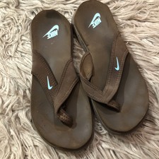 nike south beach flip flops brown