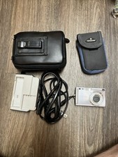 Pentax Optio S5i digital camera with battery  512 MB SD card, And Charger,Works