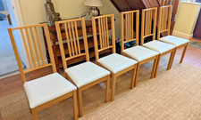 Set of 6 Ikea Borje Oak Dining Room Chairs with cream cushioned bases